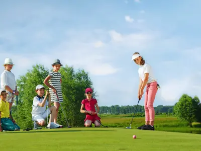 summer day camps golf program showing young golfers learning how to golf
